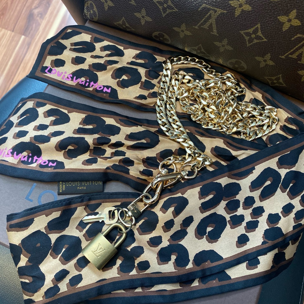 Louis Vuitton lock and key with chain